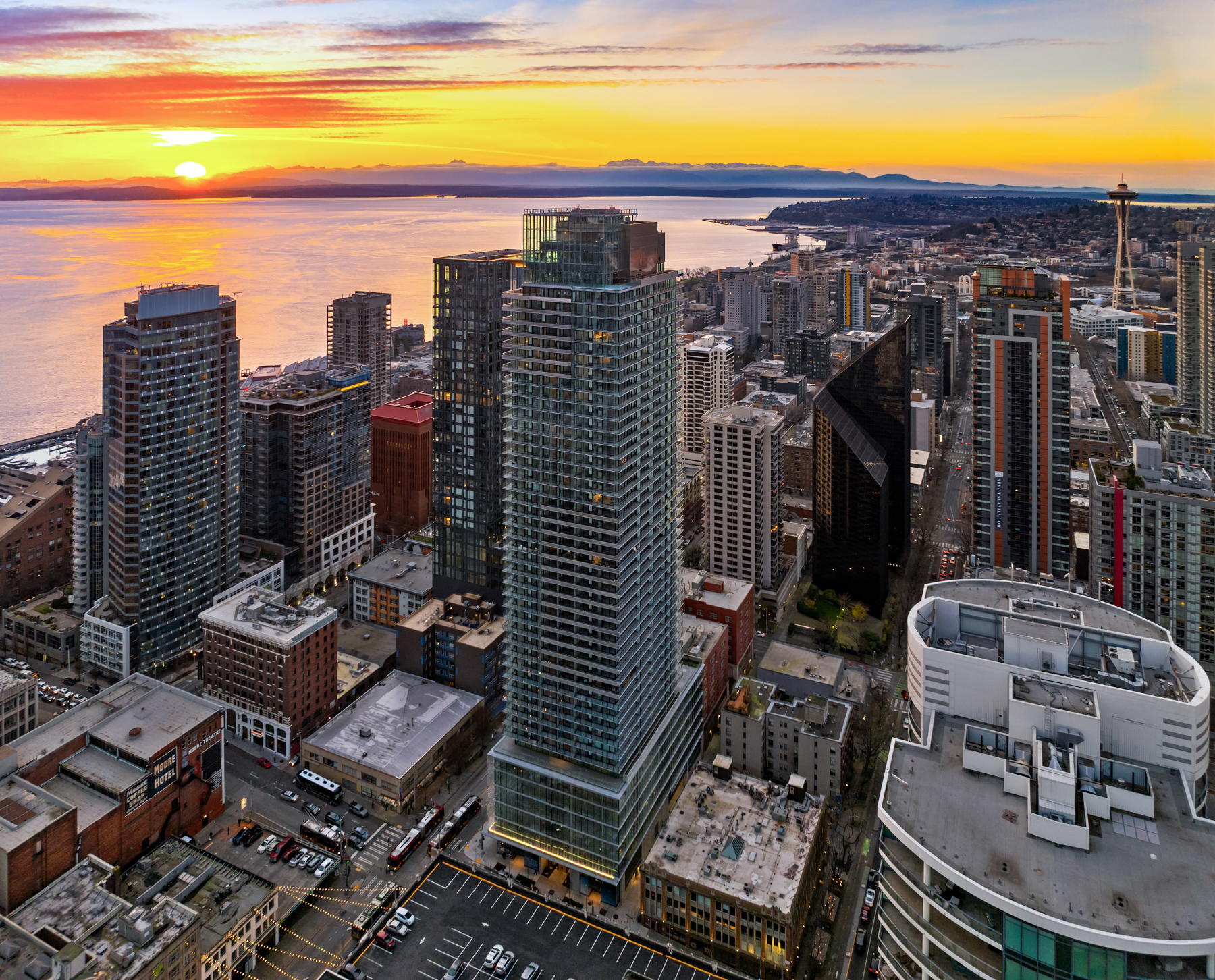 First Light tower against an Elliott Bay sunset